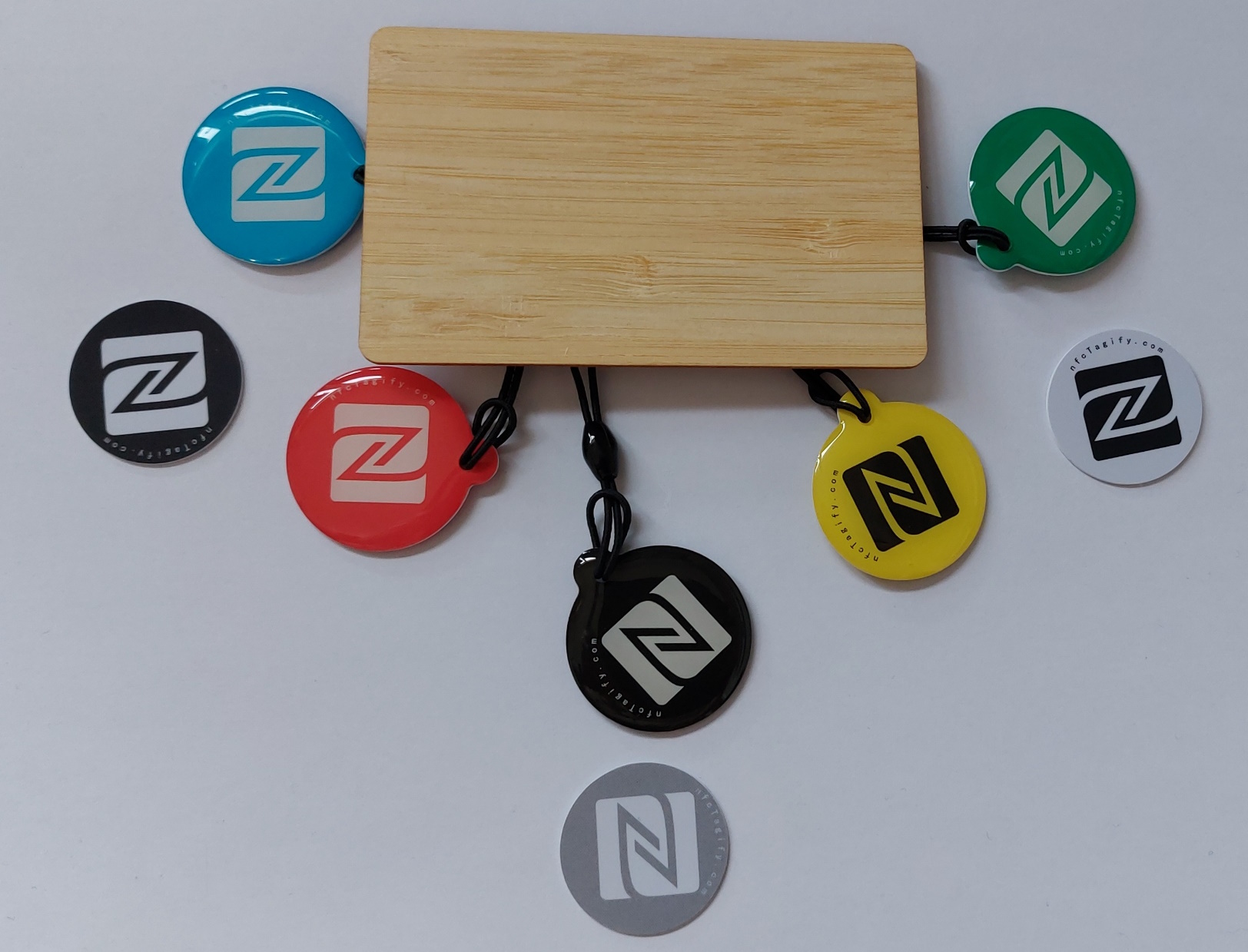 Bamboo NFC Card, with multi coloured NFC tags and small NFC button tags